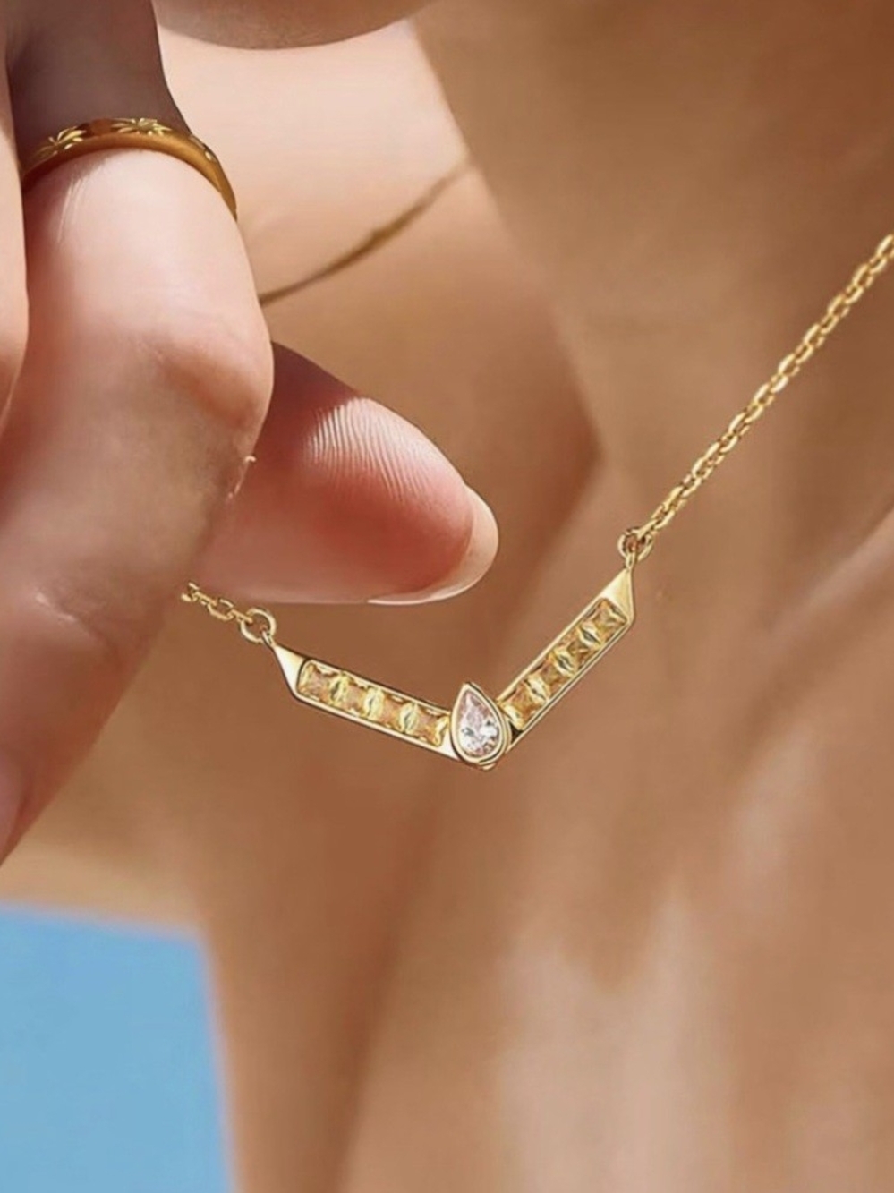 Gold Chevron Pendant Necklace with Yellow Stones